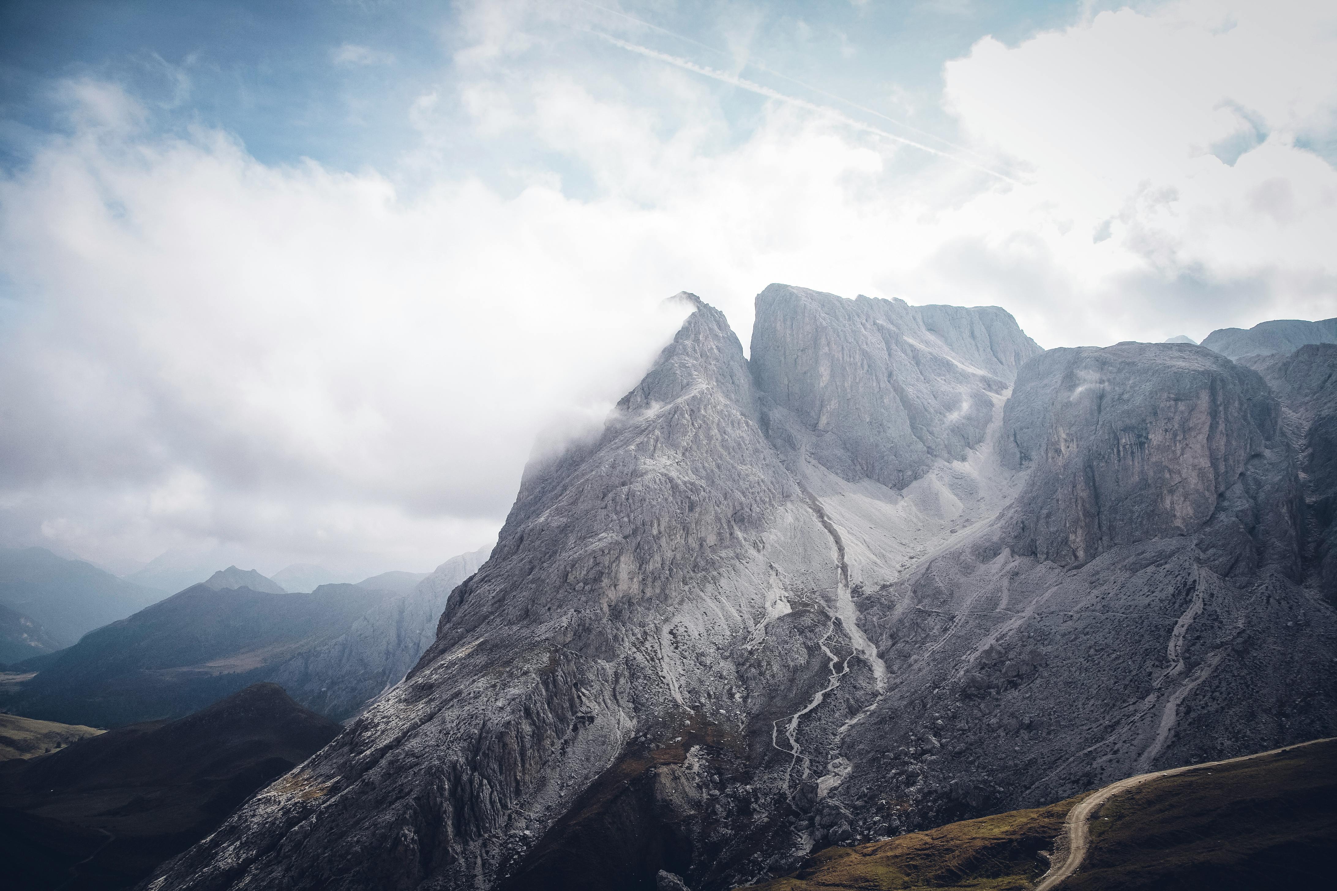 Gray Mountains Under Cloudy Sky · Free Stock Photo