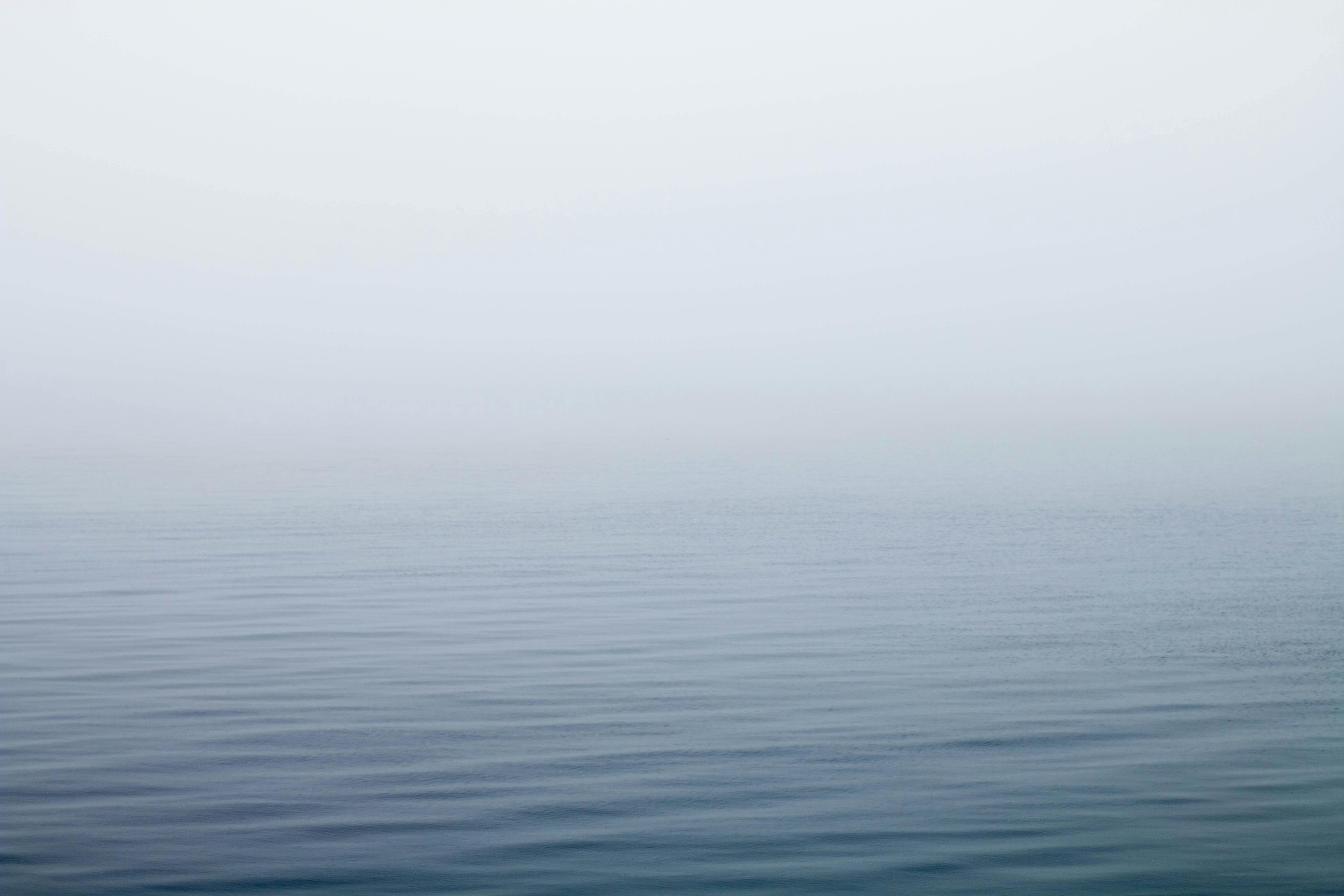 Body of Water Under Fog · Free Stock Photo