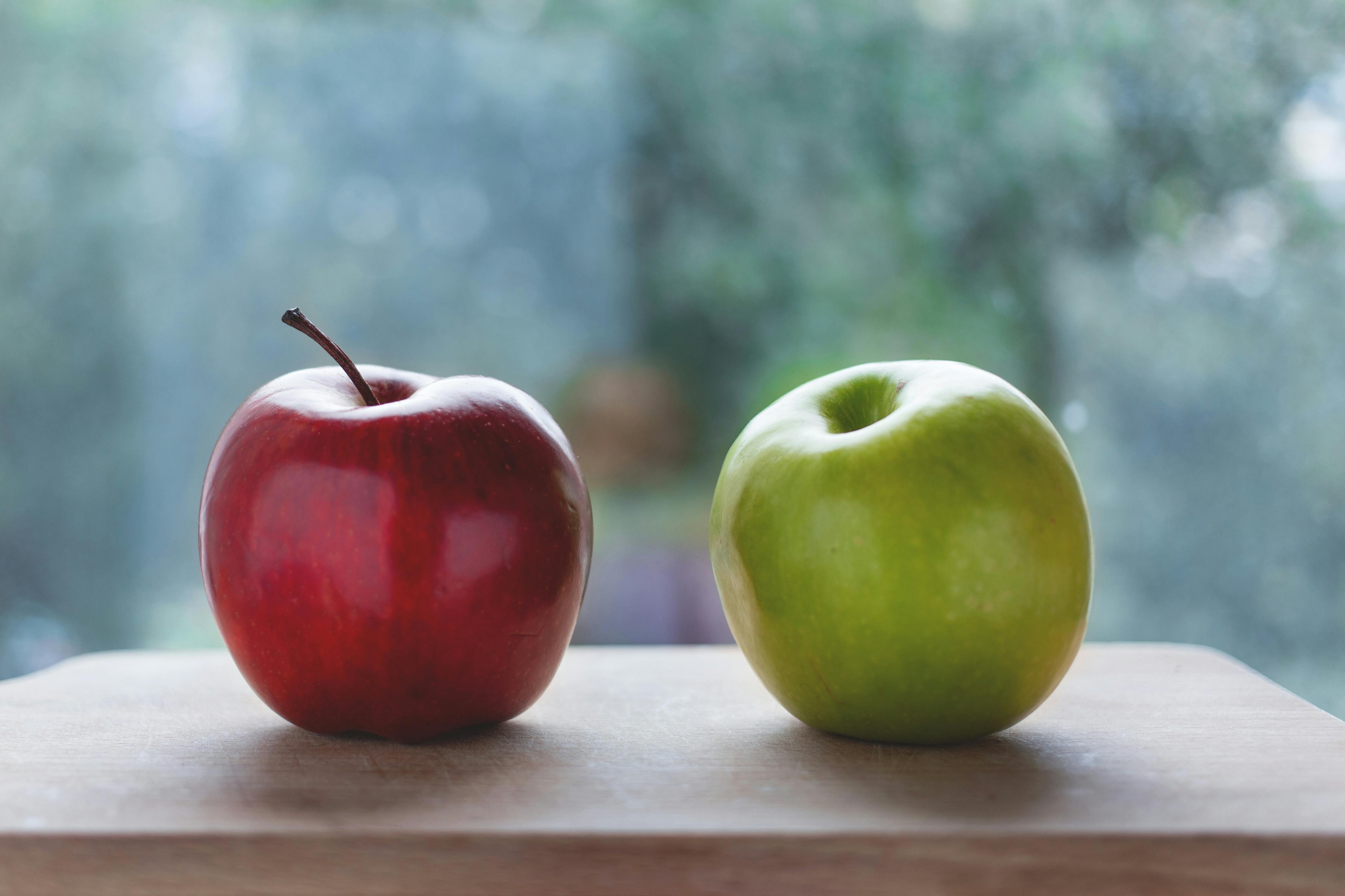 red-apple-beside-the-green-apple-free-stock-photo