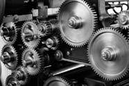 Gray Scale Photo Of Gears Free Stock Photo