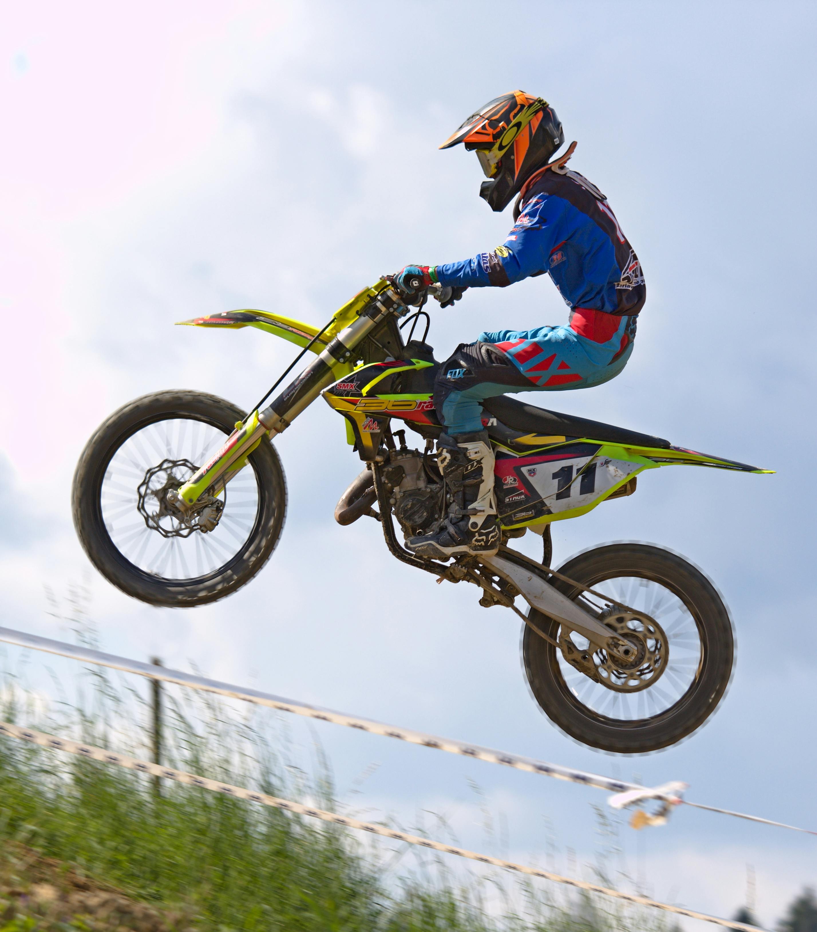 Person Doing Stunt in Motocross Dirt Bike · Free Stock Photo