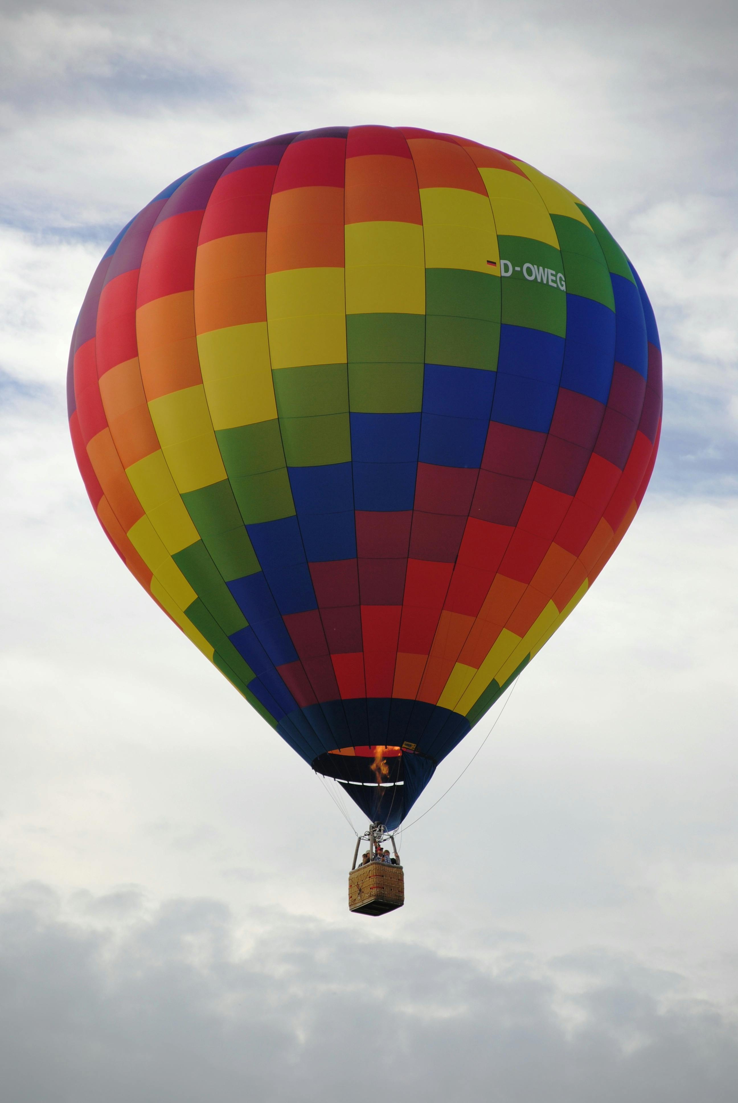 Multi Colored Hot Air Balloon's Grown Shot during Daytime · Free Stock