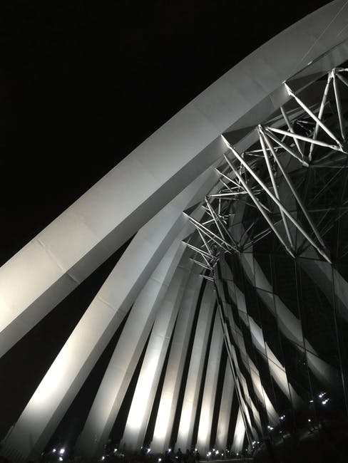 Low Angle Photo of Designer\'s Structure during Nighttime