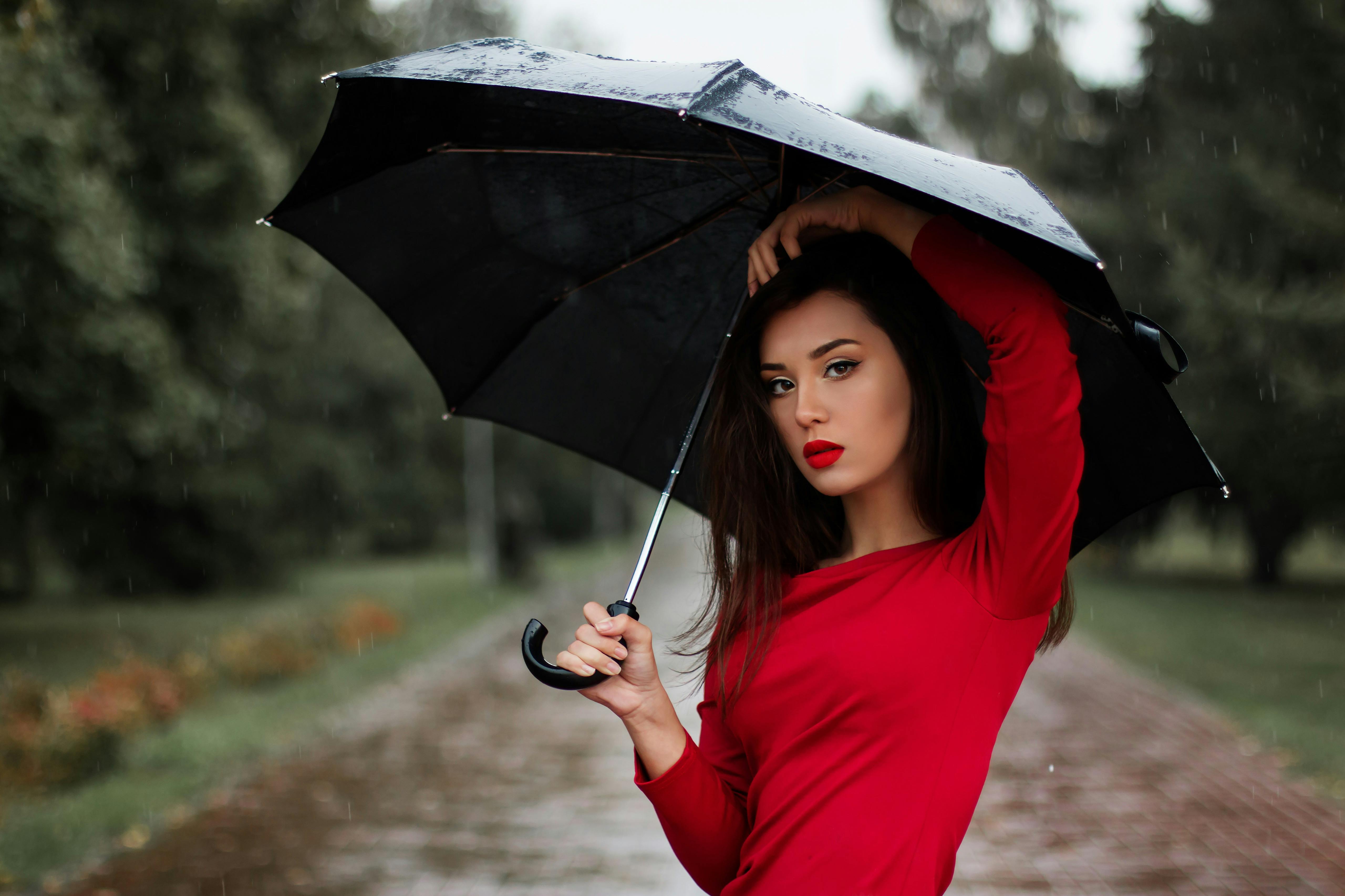 Portrait of Young Woman With Umbrella · Free Stock Photo