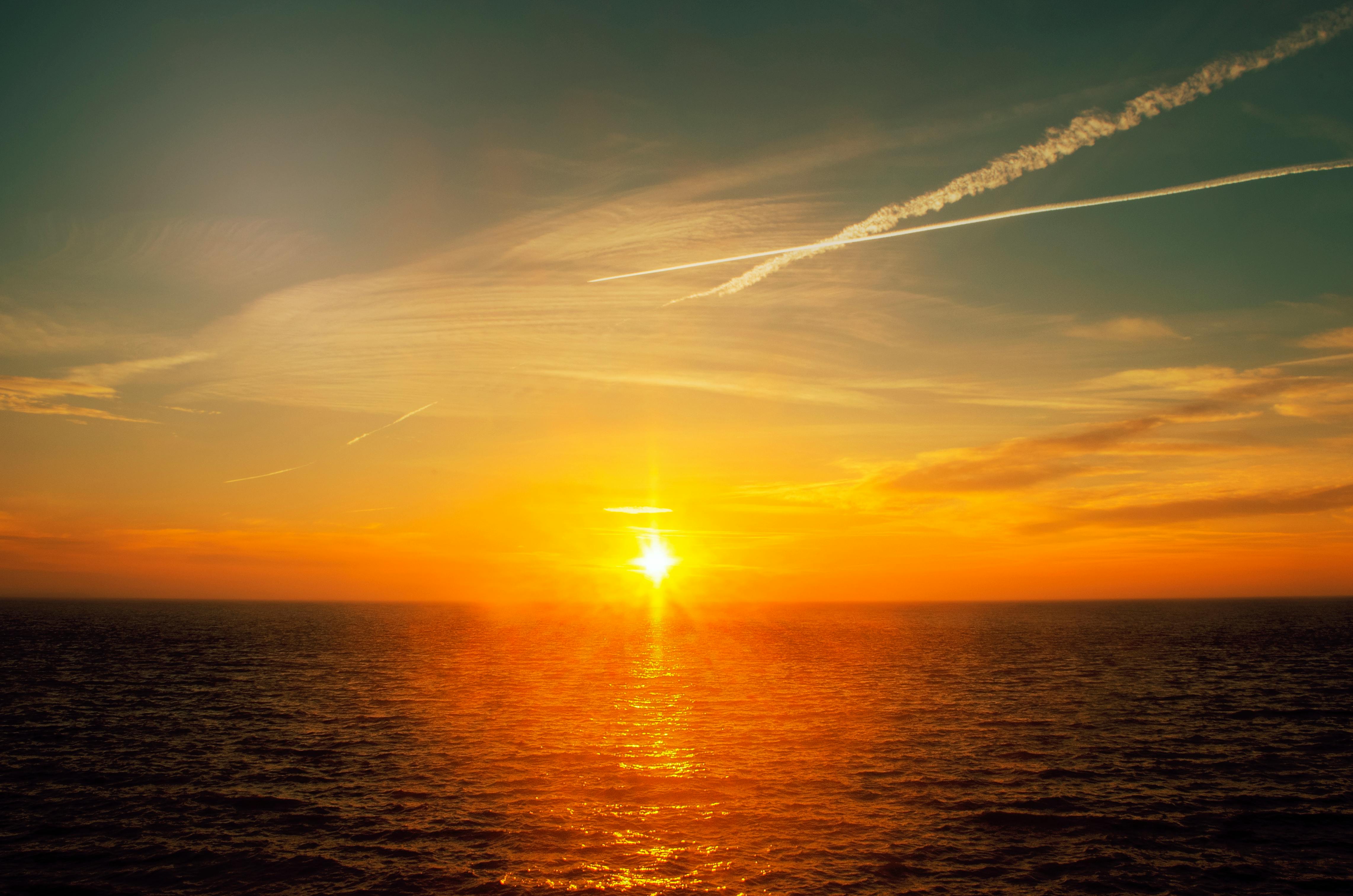 Scenic View Of Sea Against Sky During Sunset · Free Stock Photo