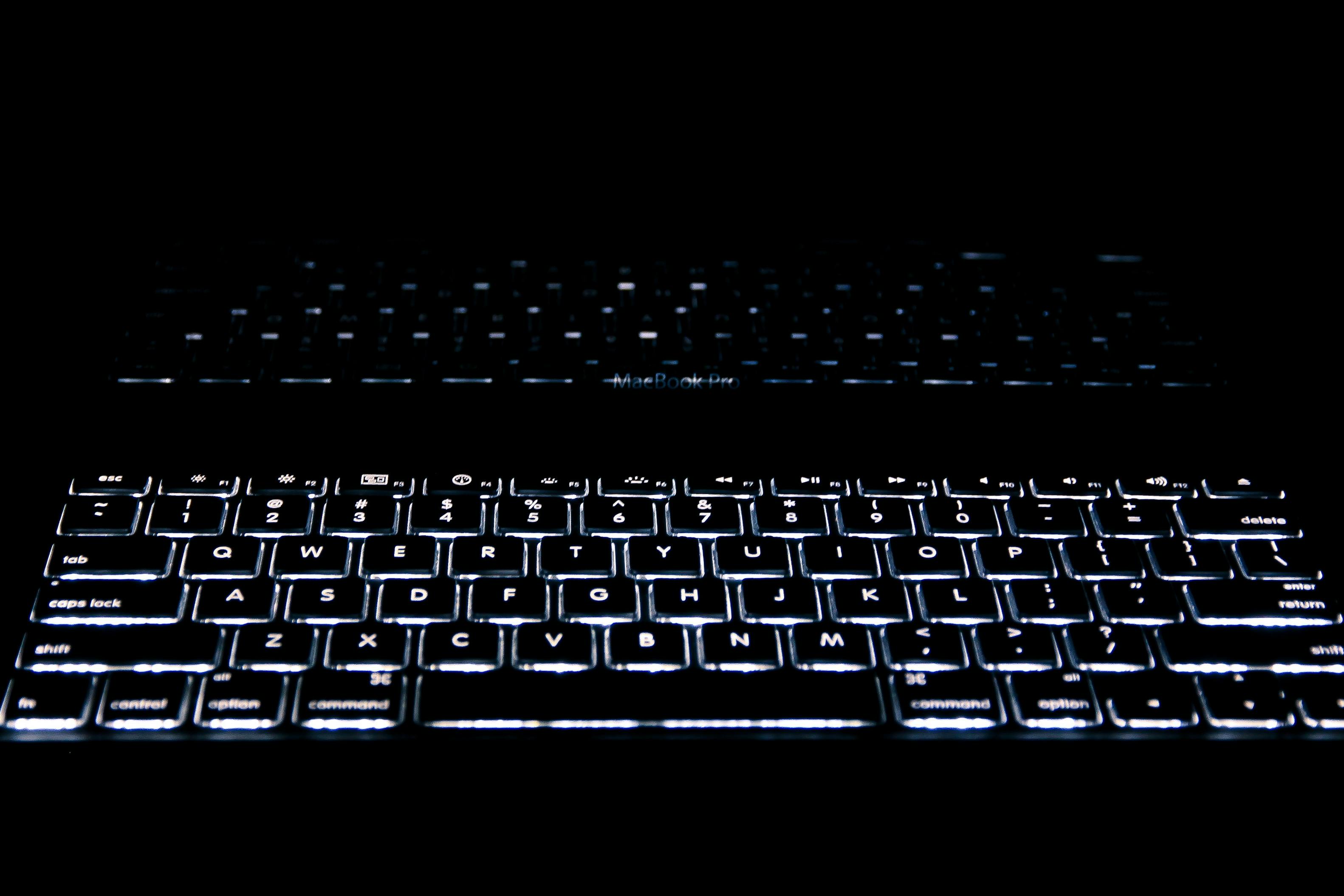 Close up of Computer Keyboard  Against Black Background 