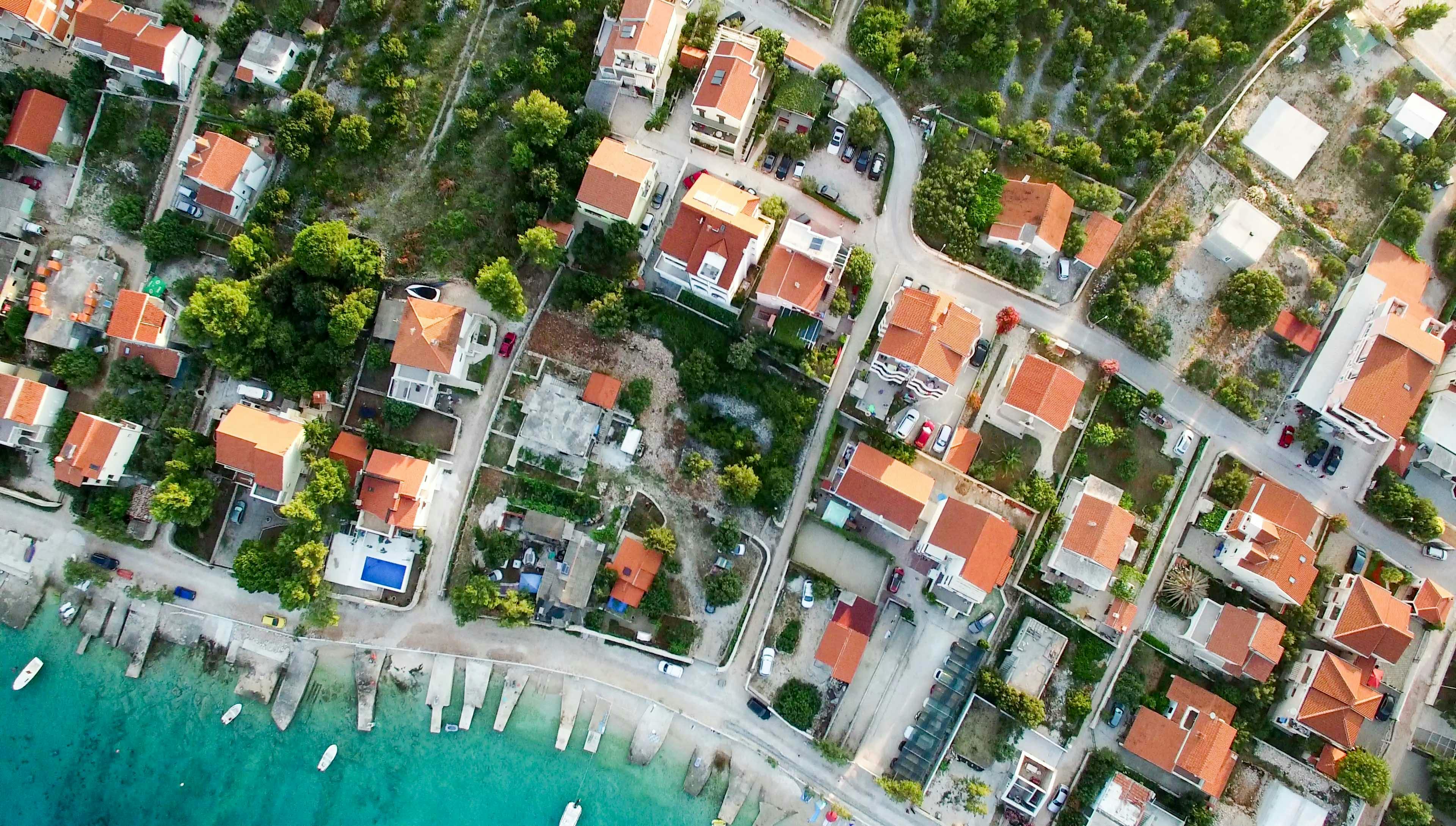 An aerial image of sea-side houses.