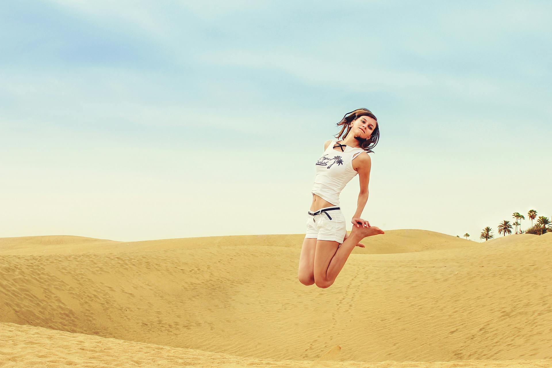 Full Length of a Woman Standing in a Desert · Free Stock Photo