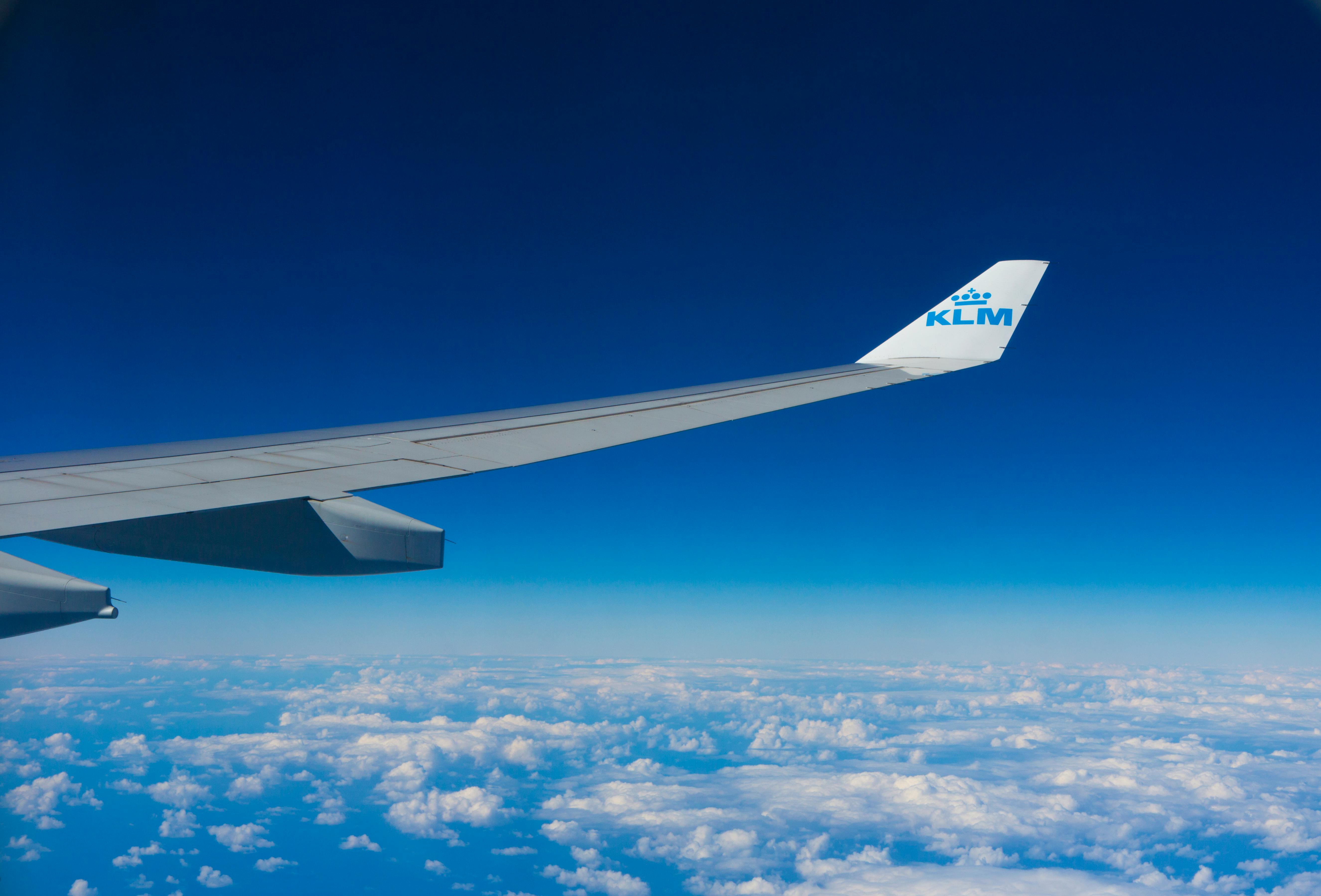 The wingtip of a KLM airplane as it cruises at 30,000 feet. 
