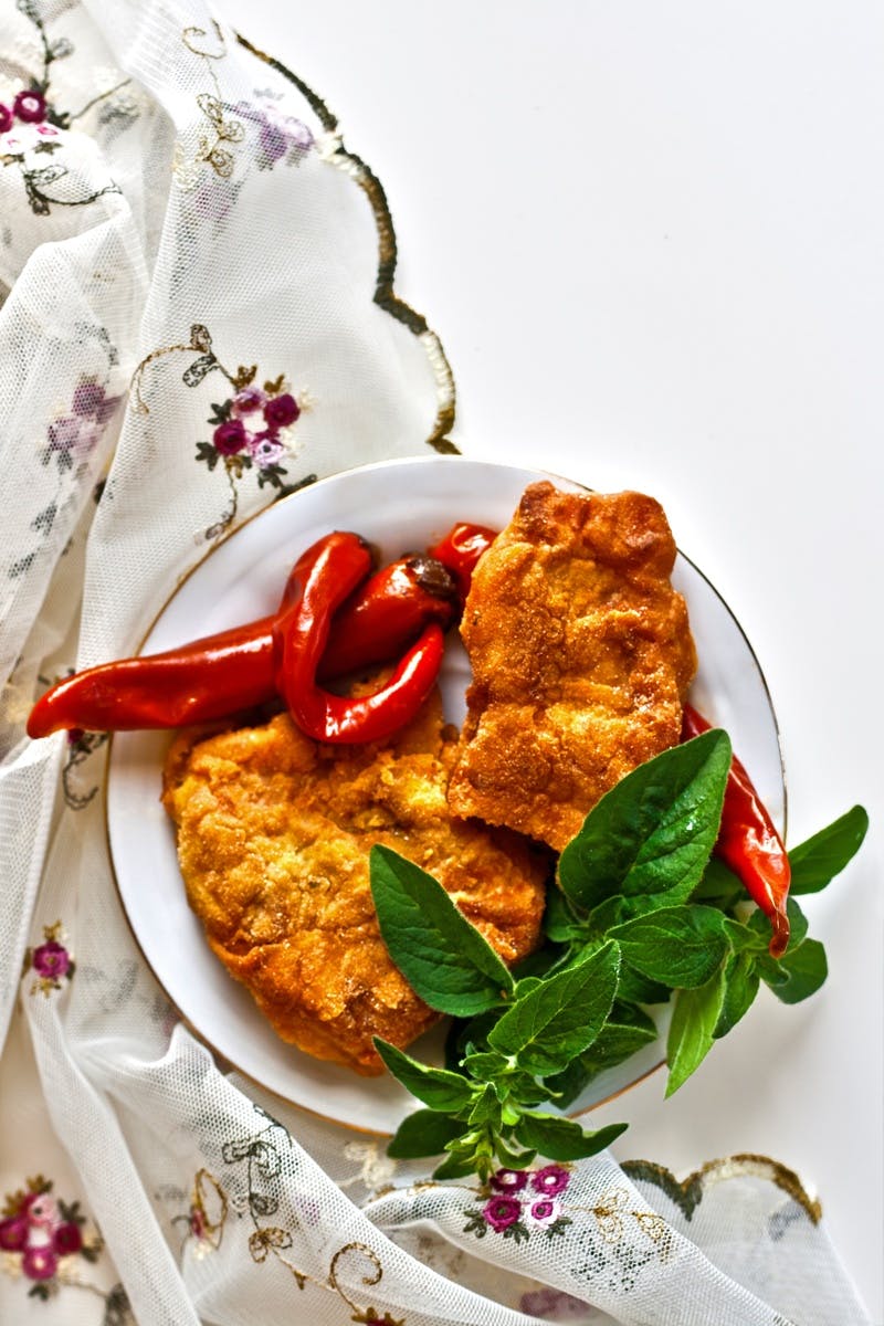 Fried fish with chili pepper and mint II · Free Stock Photo