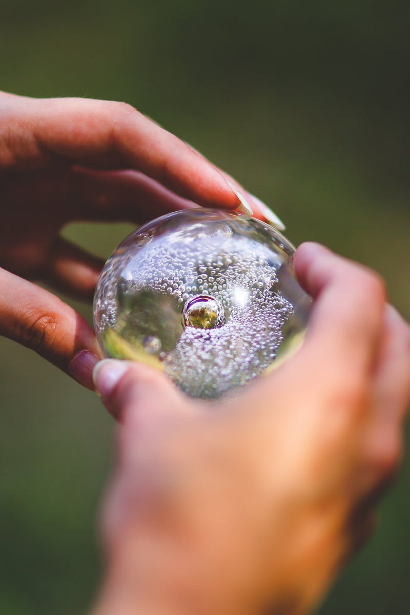 Crystal ball in hands · Free Stock Photo
