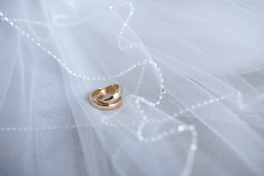 Gold wedding rings with decoration \u00b7 Free Stock Photo