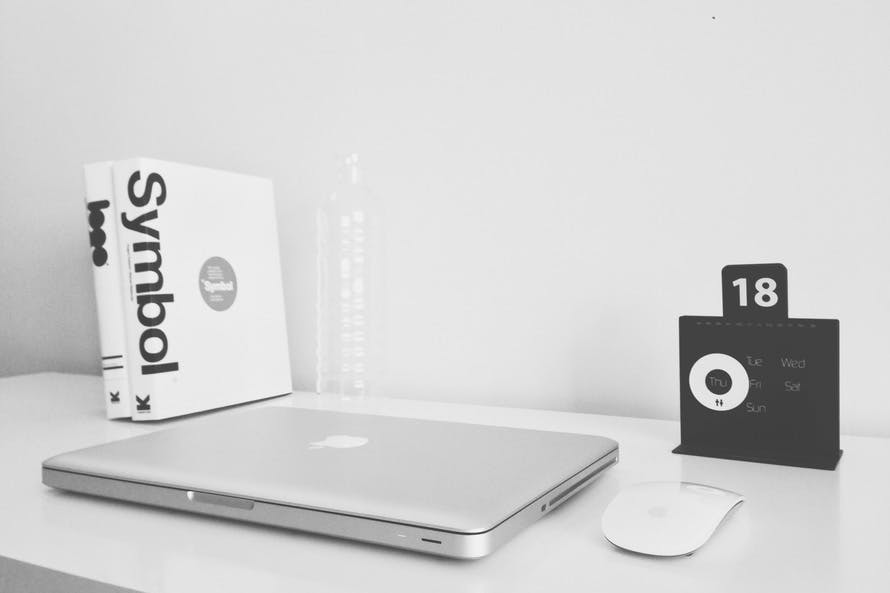 black-and-white, apple, desk