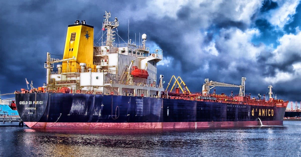 Blue and Grey Cargo Ship Navigating \u00b7 Free Stock Photo