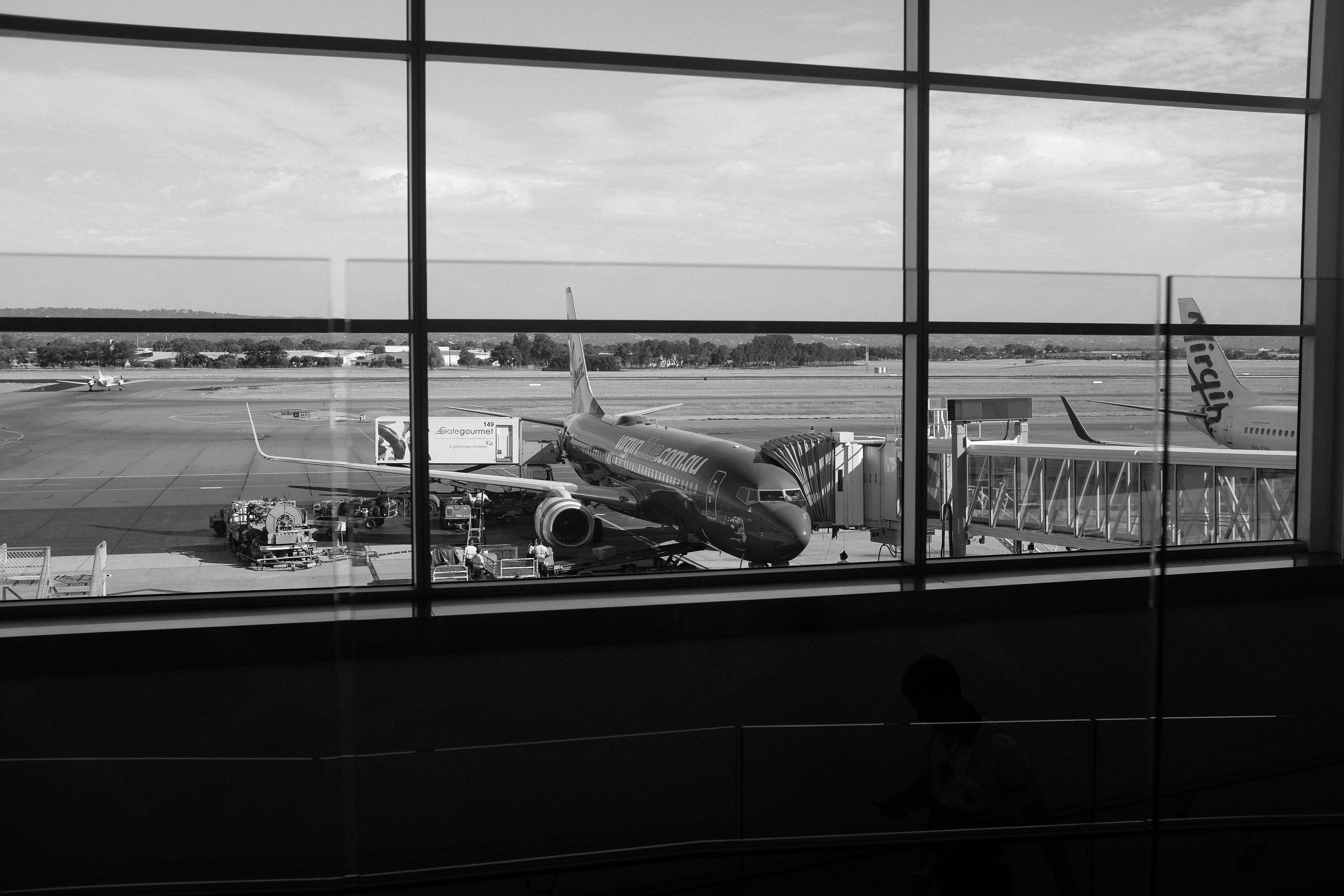 Free stock photo of airport, black-and-white, hangar