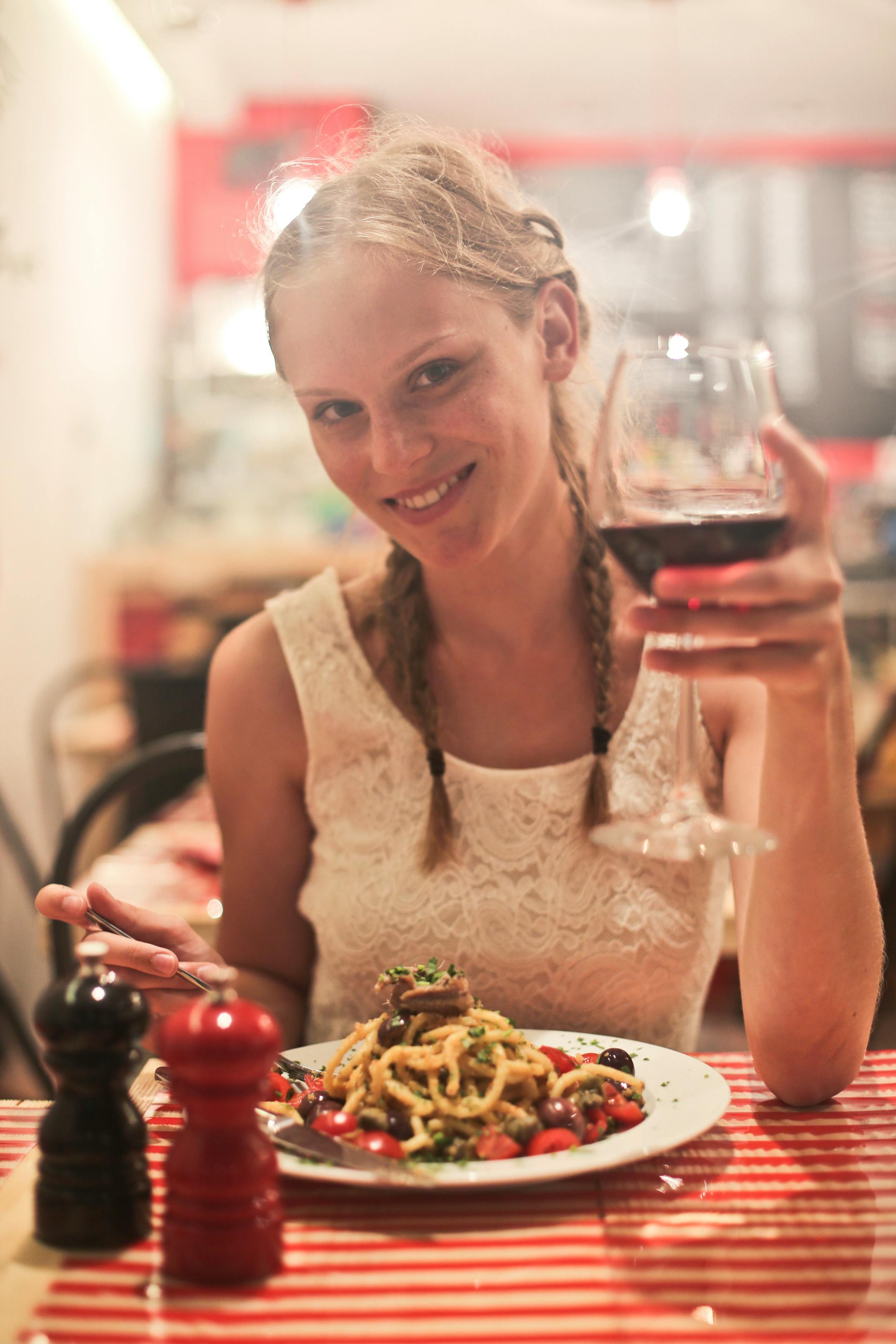 Woman in White Sleeveless Tops Holding Wine Glass · Free 