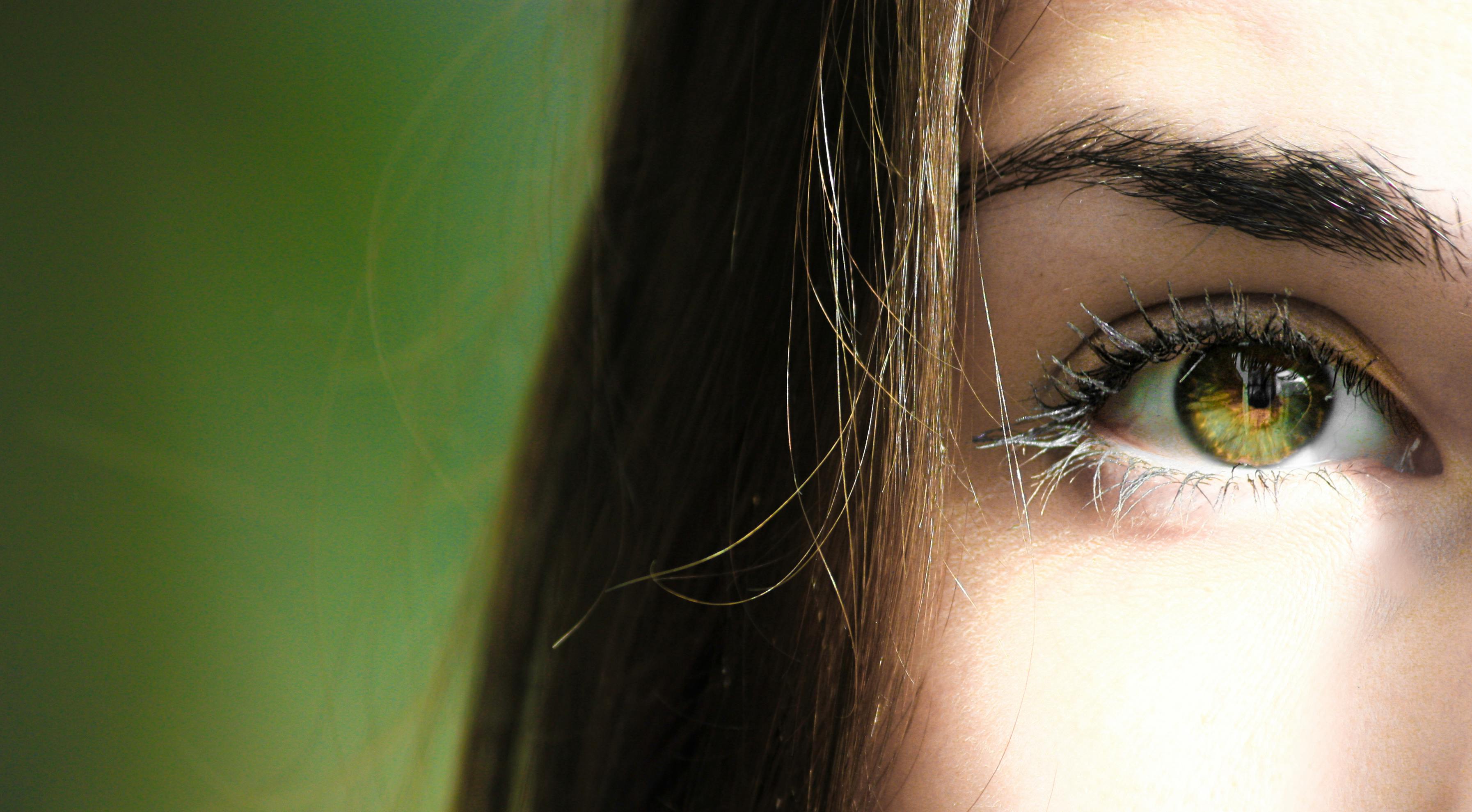 Selective Focus Half-face Closeup Photography of Female's 