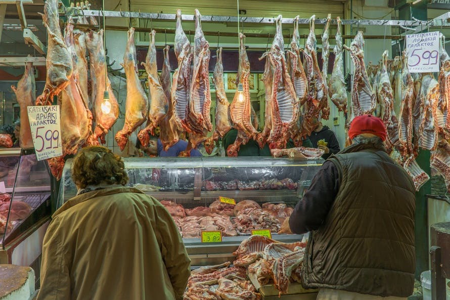 Free stock photo of butcher, customers, goat meat