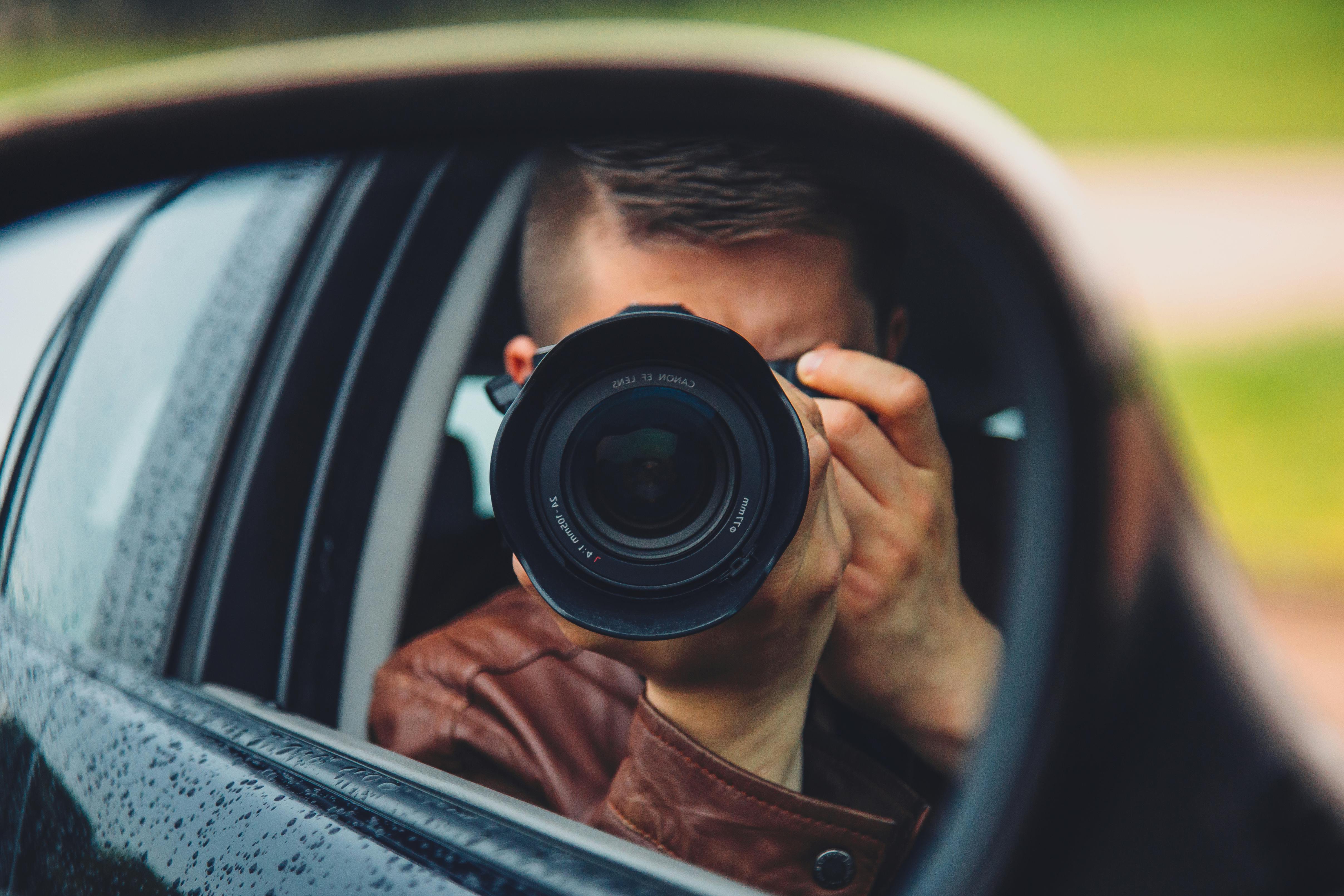 Man Taking Mirror Shot · Free Stock Photo