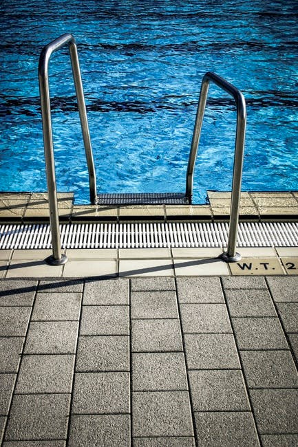 Free stock photo of access ladder, blue water, pool